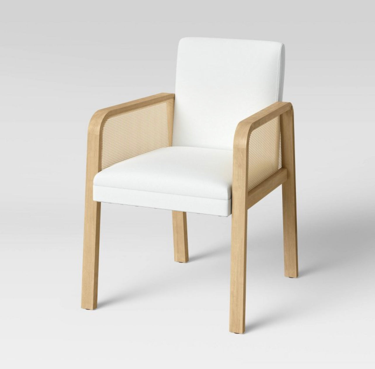 Stallings Upholstered Dining Chair with Cane Arms
